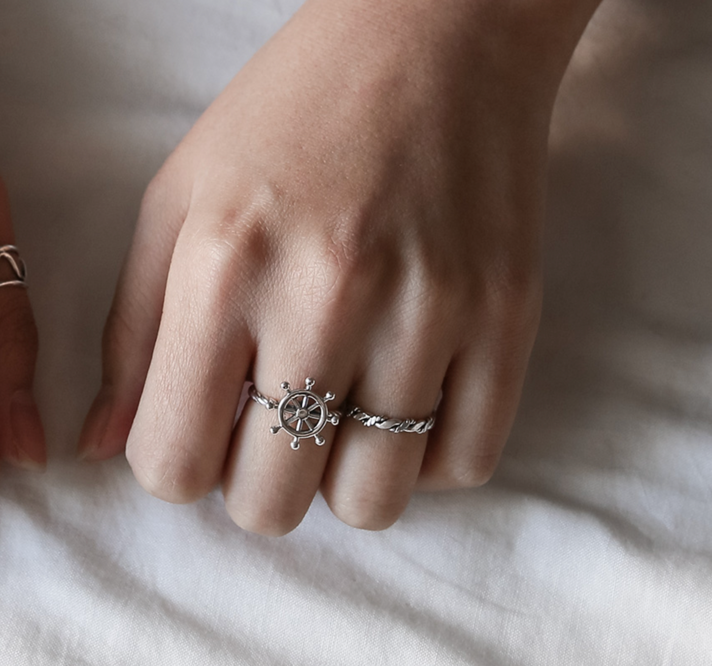 925 silver steering wheel ring on hand lifestyle photo