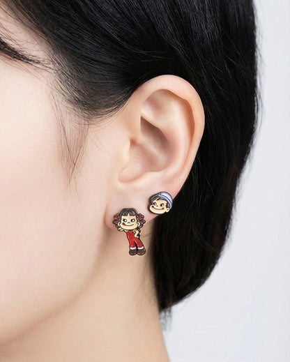 Side ear view wearing Peko Poko earrings in stud mode both characters*