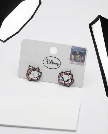 Marie cat face earrings on white card showing enamel detail and silver posts
