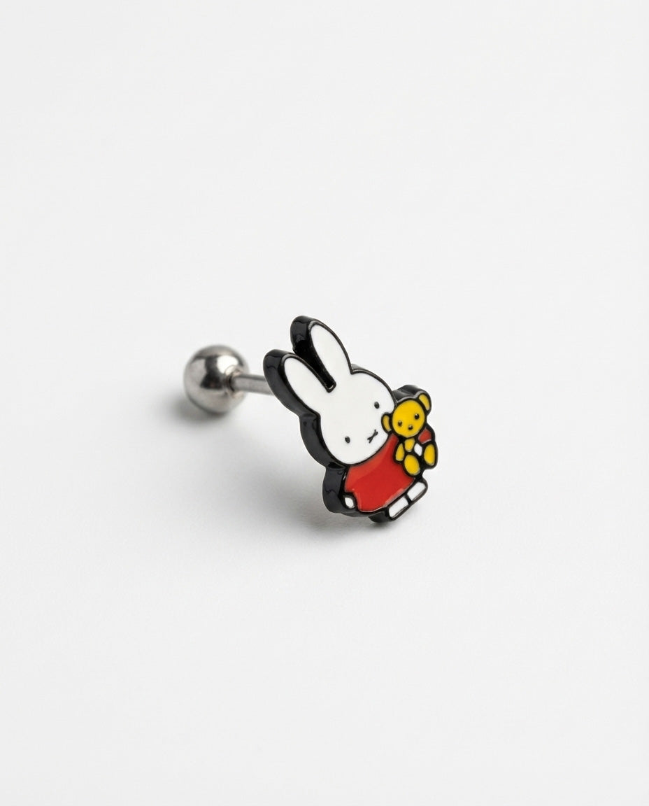 Red dress Miffy piercing with teddy bear showing surgical steel bar detail
