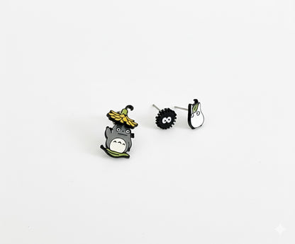 Three-piece anime earring set components laid flat on white background
