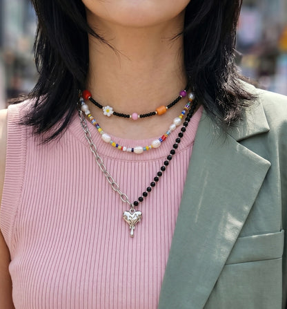 Colorful bead layered necklace stack with melting heart black crystal chain pendant, Y2K spring street festival look