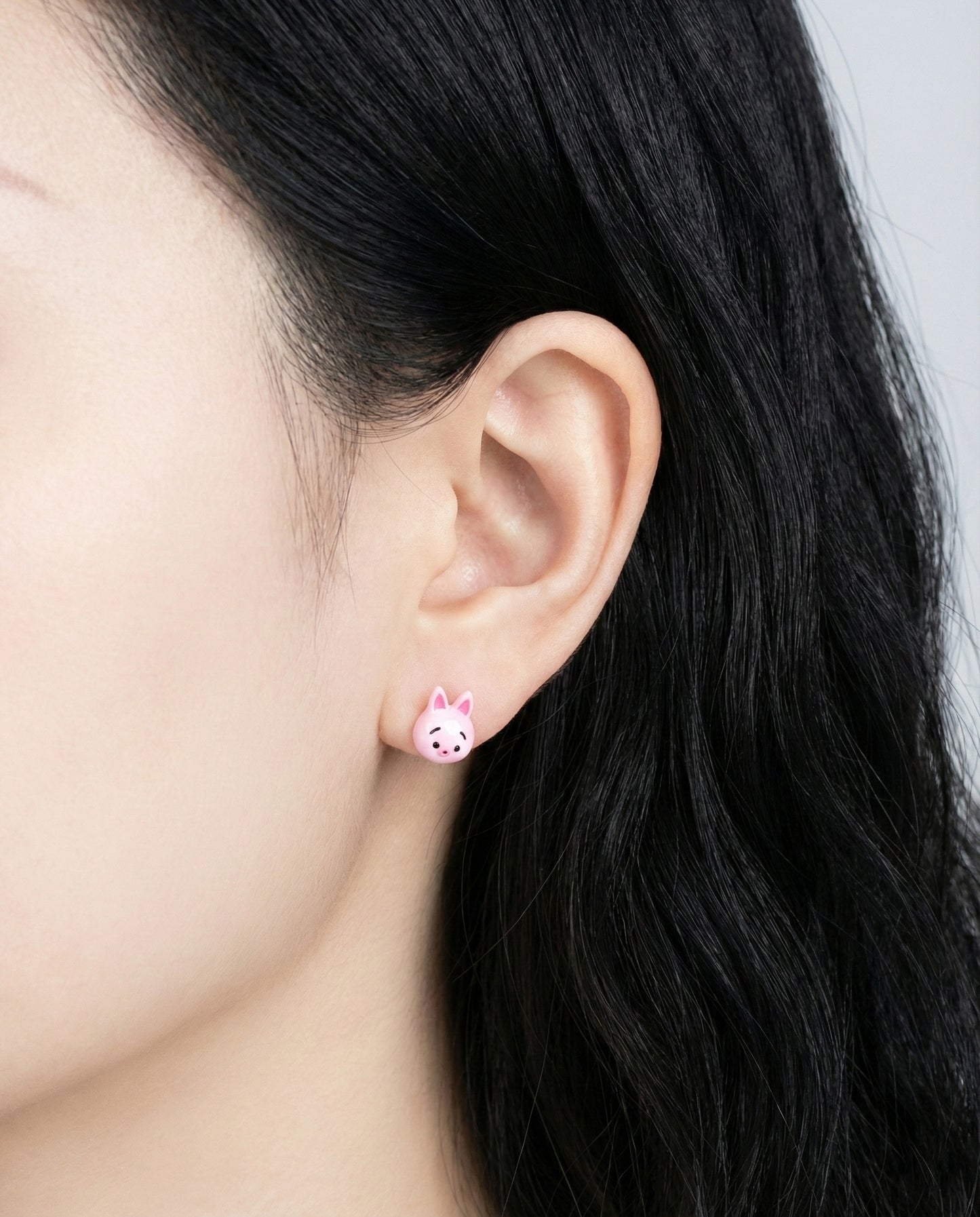 Piglet light pink Tsum Tsum stud earring on ear - sweet Disney Pooh collection jewelry