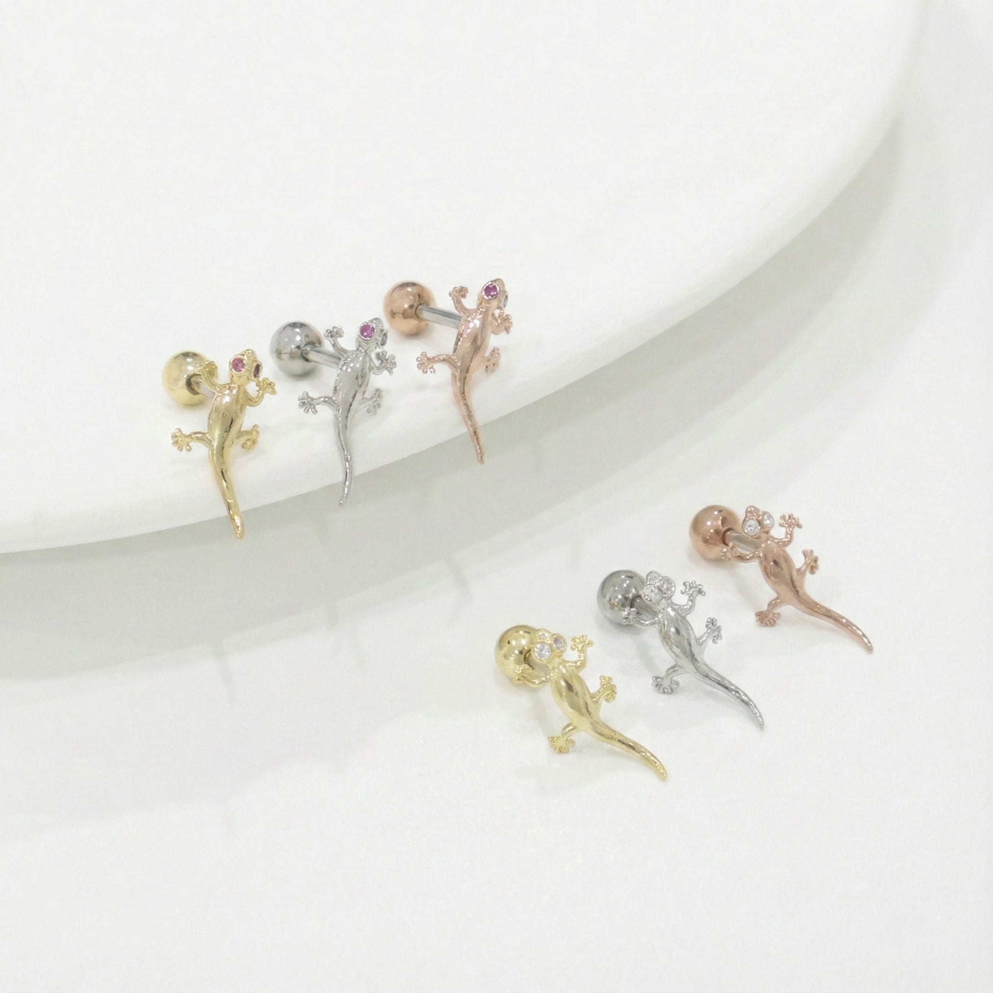 Six gecko lizard piercings with full pave cubic zirconia in gold silver rose gold, detailed animal studs