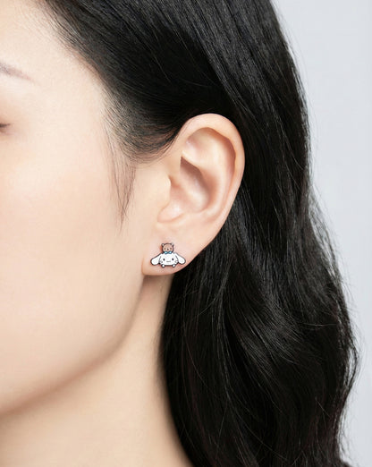 Kawaii Cinnamoroll puppy and bear asymmetric earrings worn on earlobe showing cute character design`