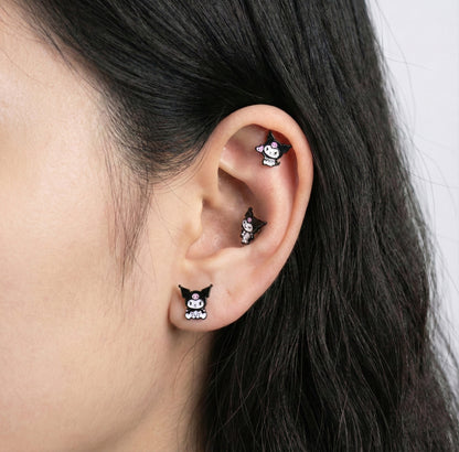 Kuromi heart pose and sitting pose enamel studs on ear with My Melody showing kawaii layered styling
