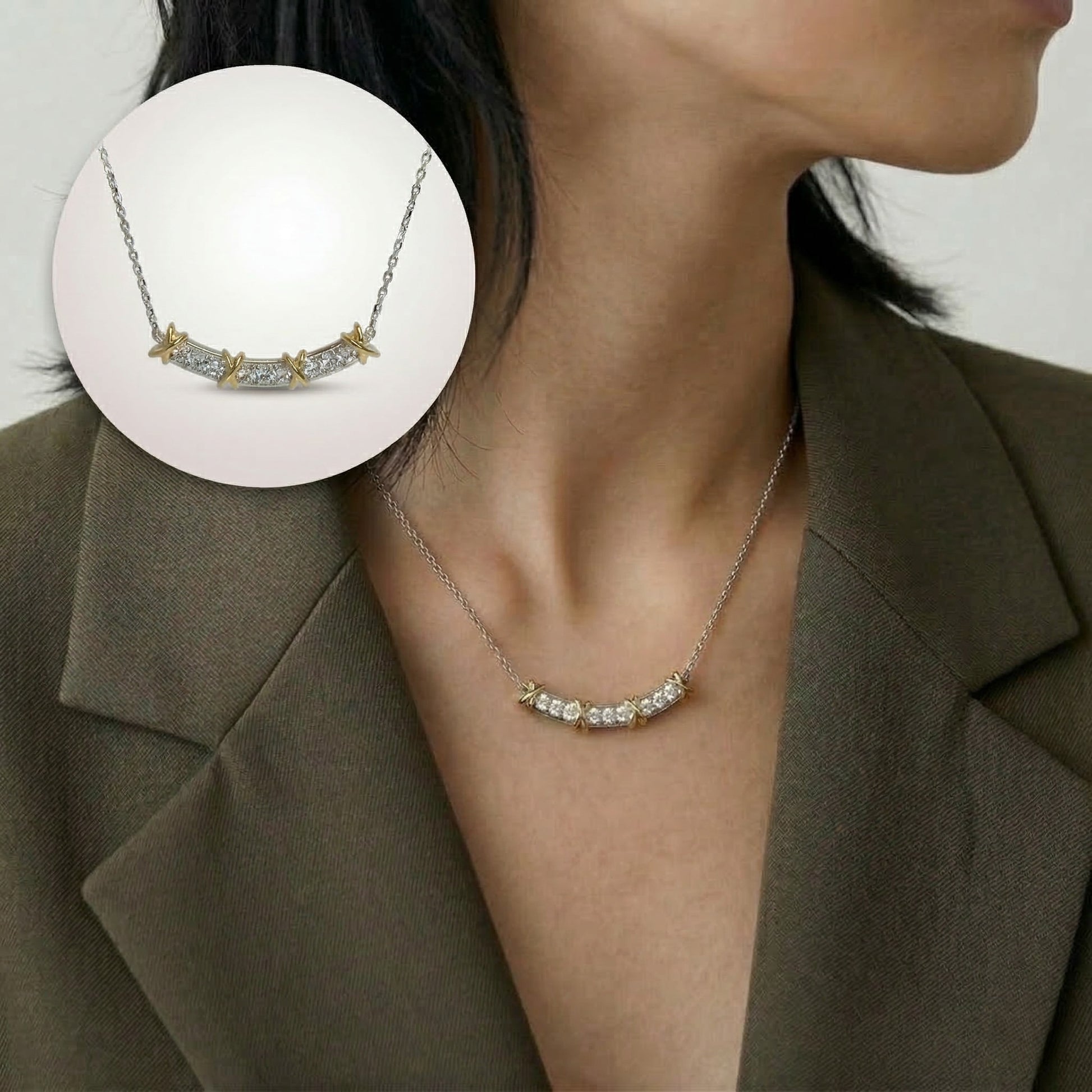 Necklace with a close-up inset on a person wearing a brown blazer.