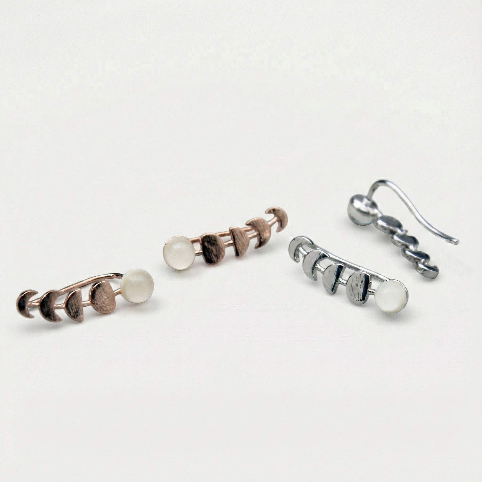 Celestial moon phase ear crawler earrings in gold and silver