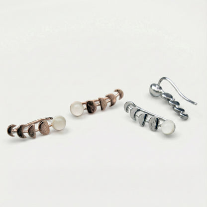 Celestial moon phase ear crawler earrings in gold and silver