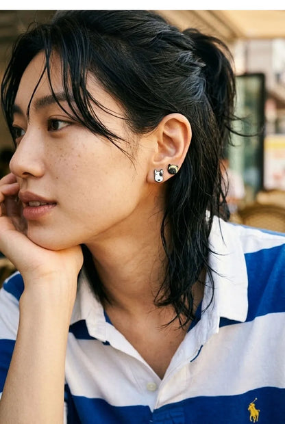 Model wearing bull terrier and French bulldog enamel stud earrings — dog mom gift jewelry, K-style street look, handmade in Korea