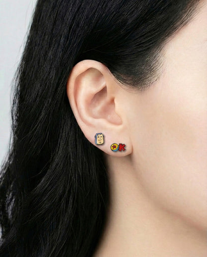 Buzz Lightyear and Pixar ball stud earrings worn on ear Korean jewelry