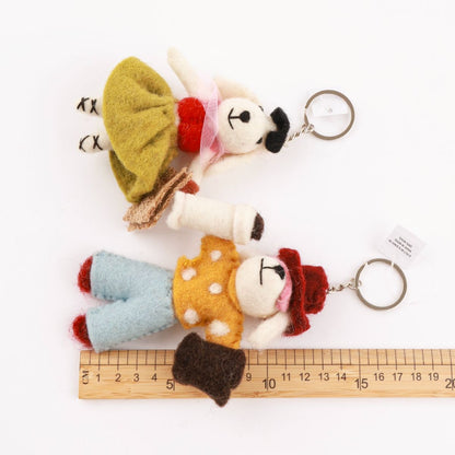 Size comparison of handmade wool felt dog keychains with ruler - 8-10cm artisan keyrings