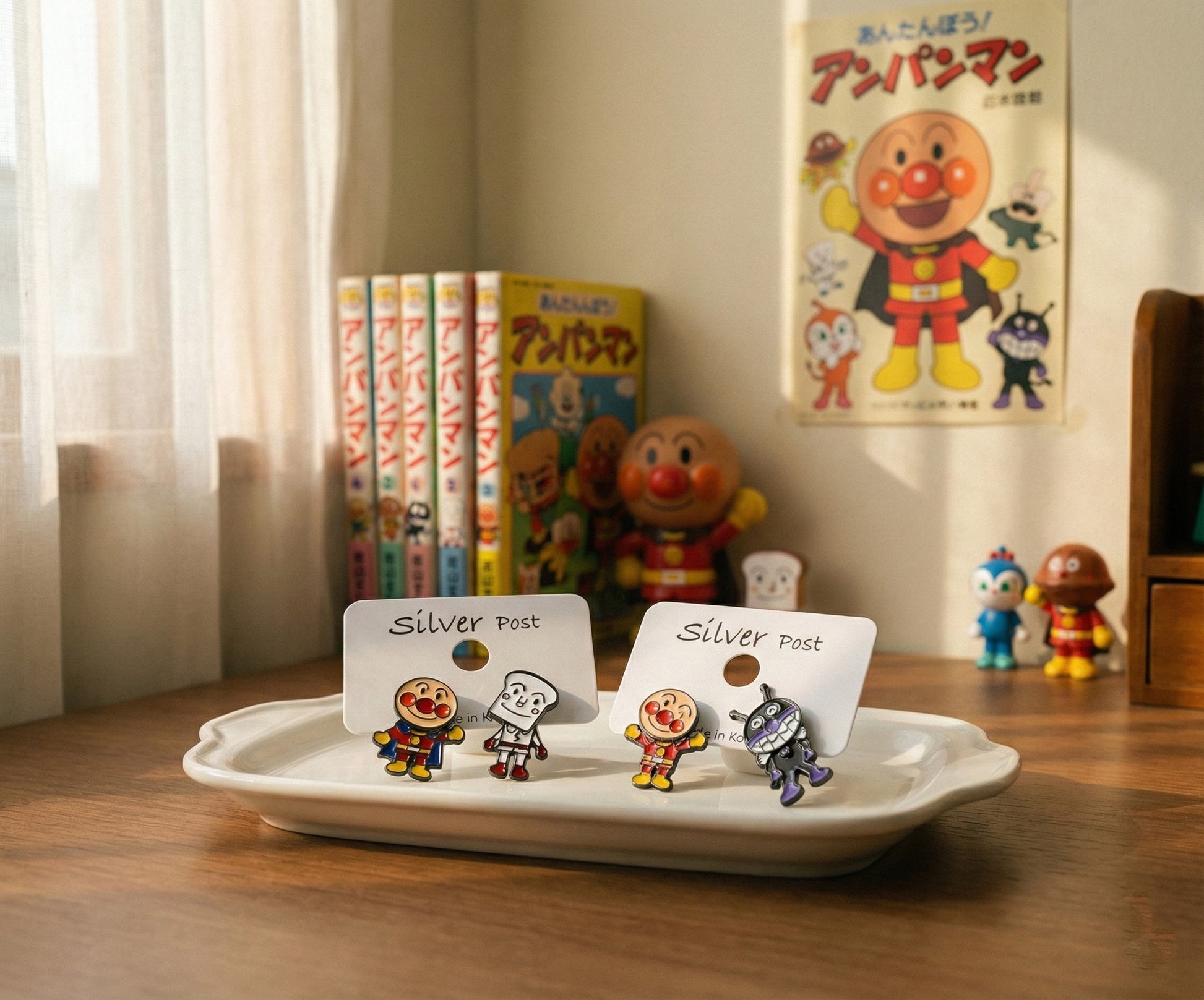 Anpanman earrings collection with vintage book background