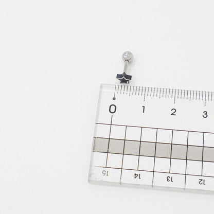 Black star cartilage stud next to measuring ruler showing 6mm size