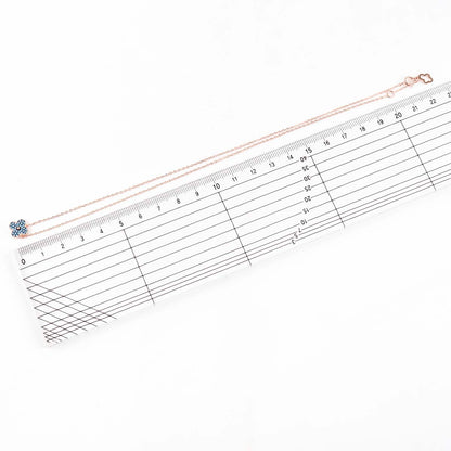 Size measurement of clover pendant and earrings, 8mm dimensions with ruler