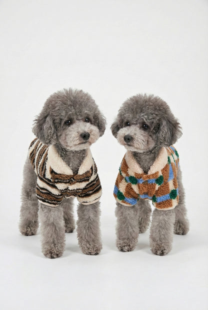 Close-up of two gray poodles wearing matching sherpa fleece dog cardigans front view