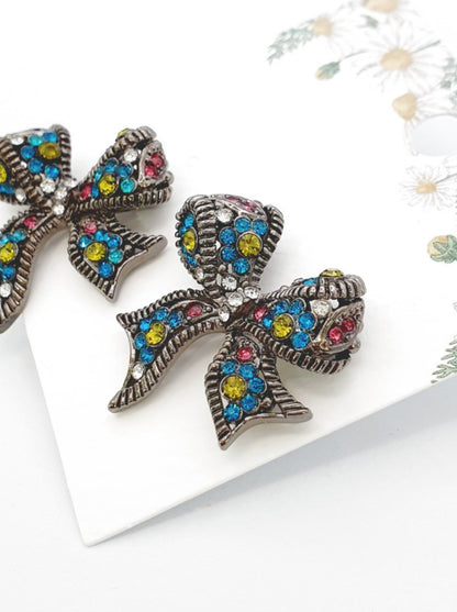 Vintage Kitsch Bow Earrings - Chunky Retro Ribbon Statement Studs with Sparkling Crystals