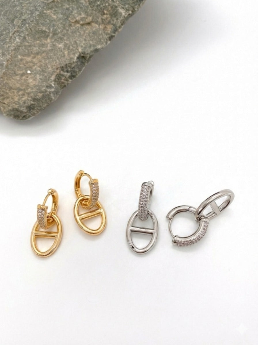 Gold and silver pavé huggie drop earrings with anchor link chain design