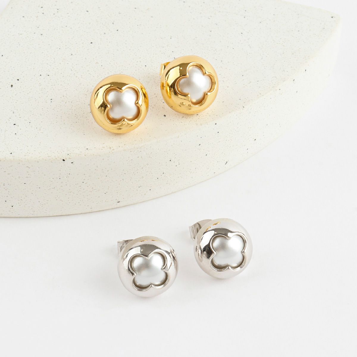 Gold and silver 3D Clover Swarovski Pearl Studs — chunky statement earrings in two tones for your Clean Girl or Quiet Luxury everyday look.