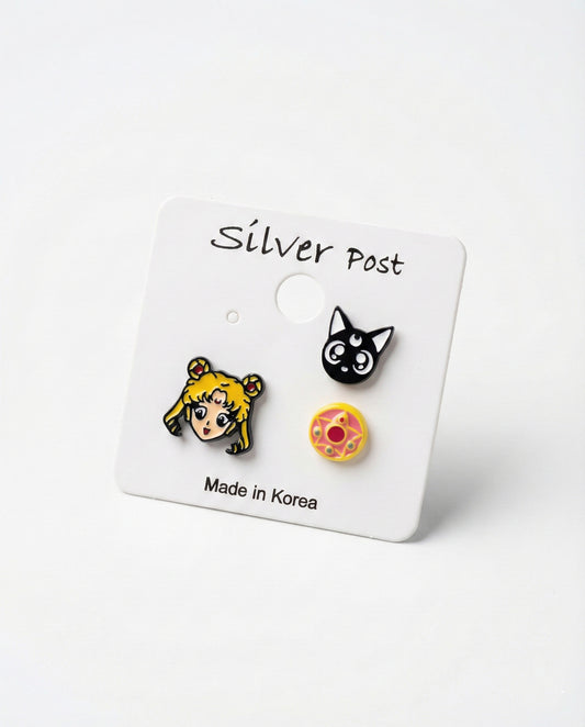 Sailor Moon Luna and Crystal Star Compact 3-piece enamel earring set on white card with Made in Korea label