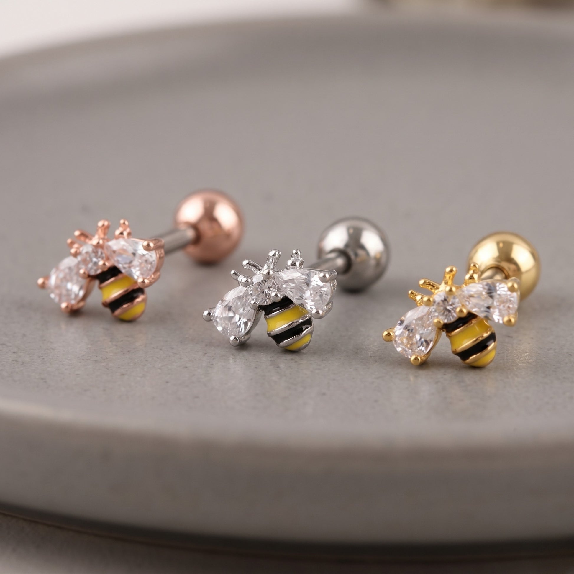 K-style flat lay bumblebee CZ piercing stud in gold silver rose gold, surgical steel hypoallergenic, three color options all finishes.