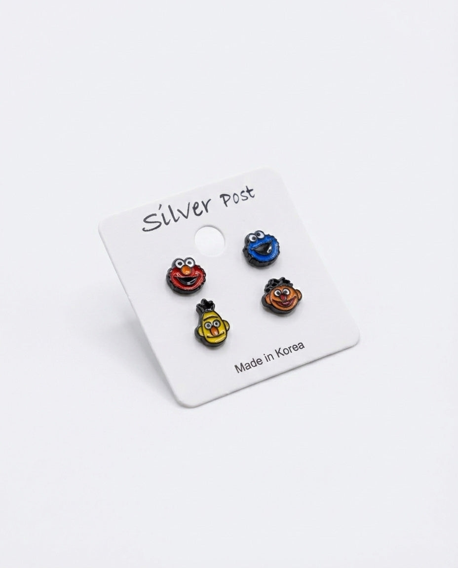 Sesame Street character earrings set of 4 on white card with silver post and Made in Korea label
