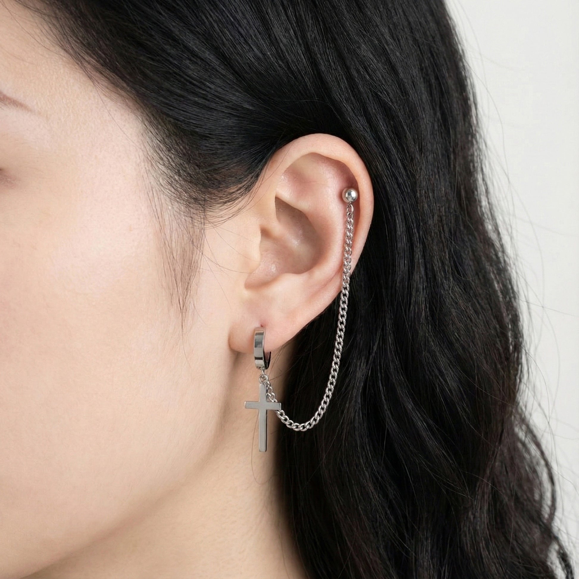 Cross chain connector piercing linking lobe to helix with silver metal finish 