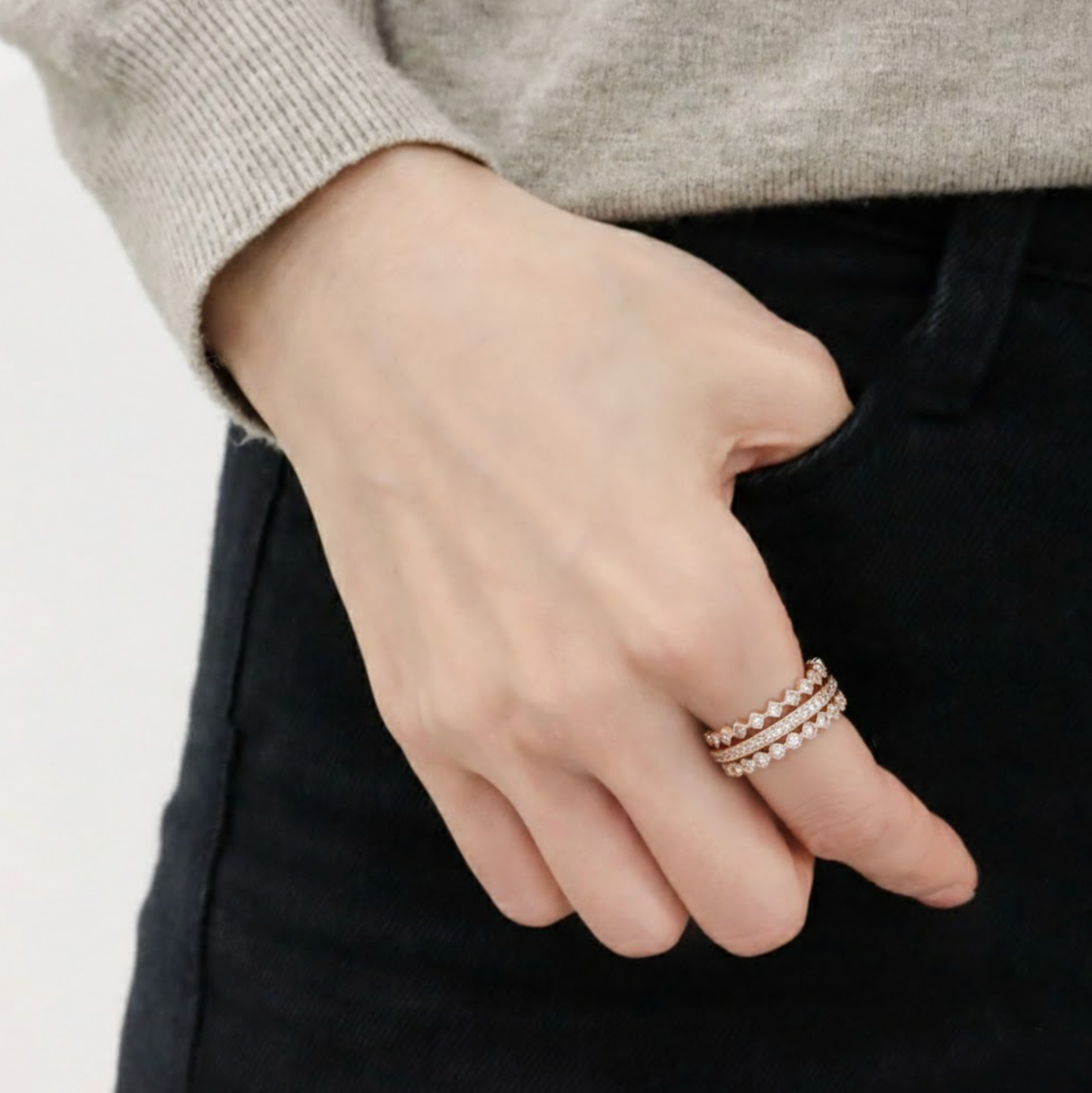 Woman wearing gold stacking rings set