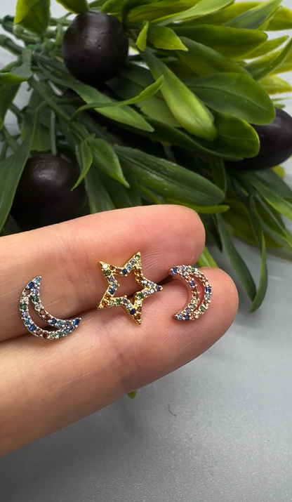 Rainbow CZ star and moon piercing sparkling in hand