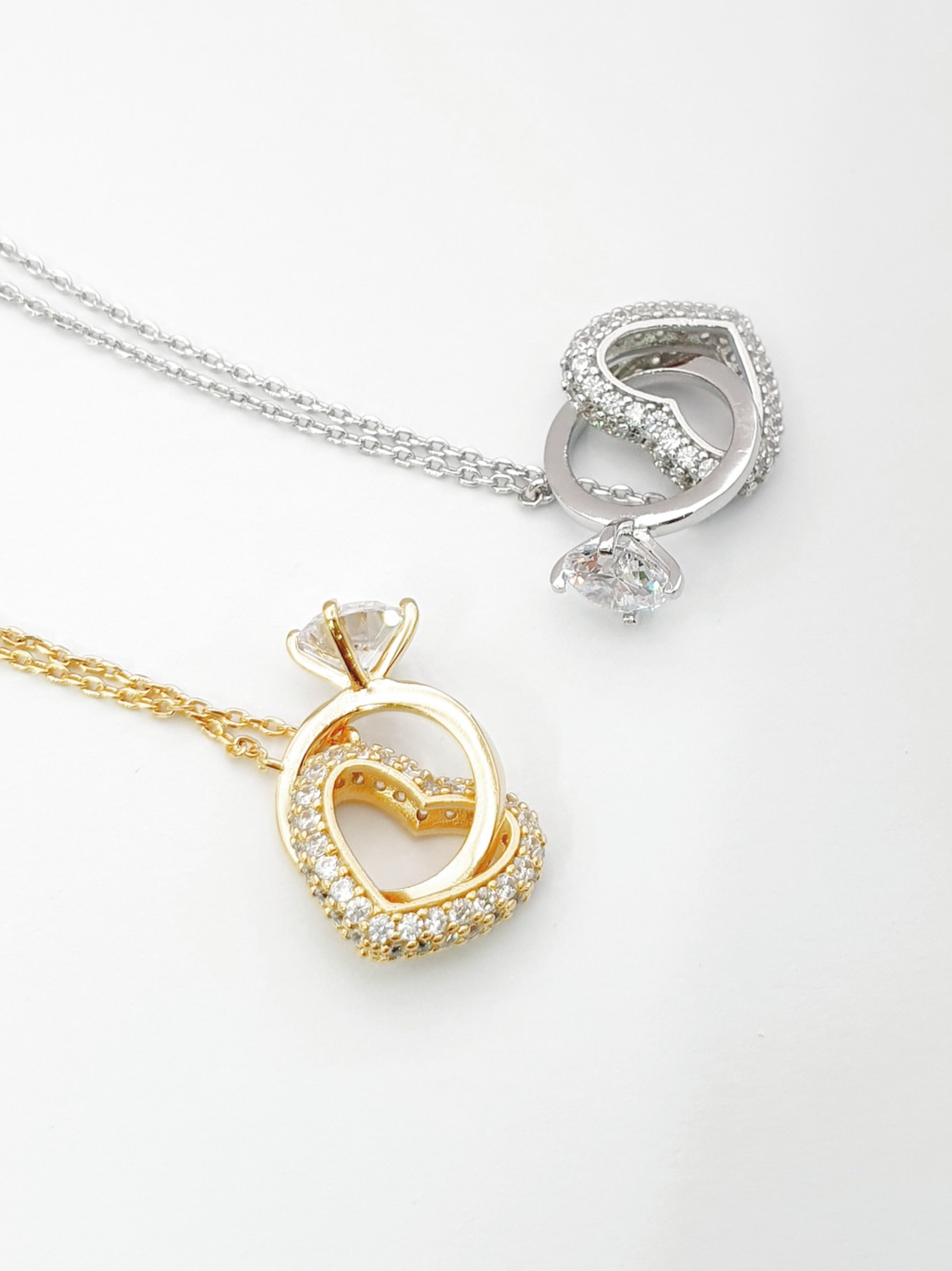 Gold and silver heart ring necklace side by side comparison