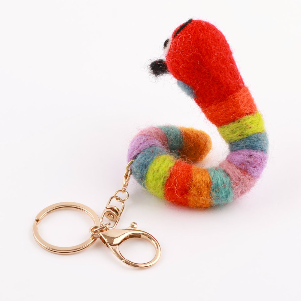Rainbow caterpillar wool felt keychain showing vibrant multicolor segments handmade