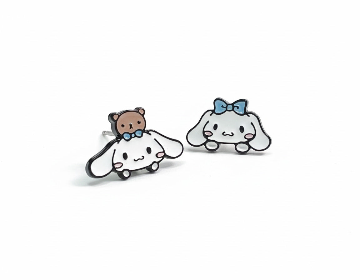 Flat lay comparison of left puppy bear and right puppy bow asymmetric earring designs