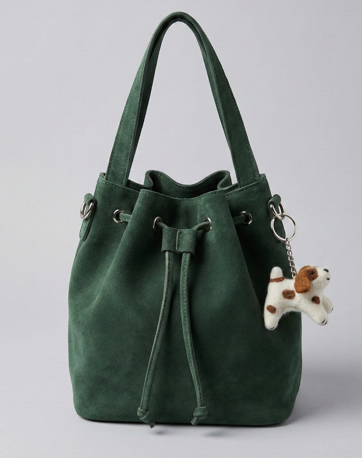  Felt puppy charm on moss green suede drawstring bucket bag