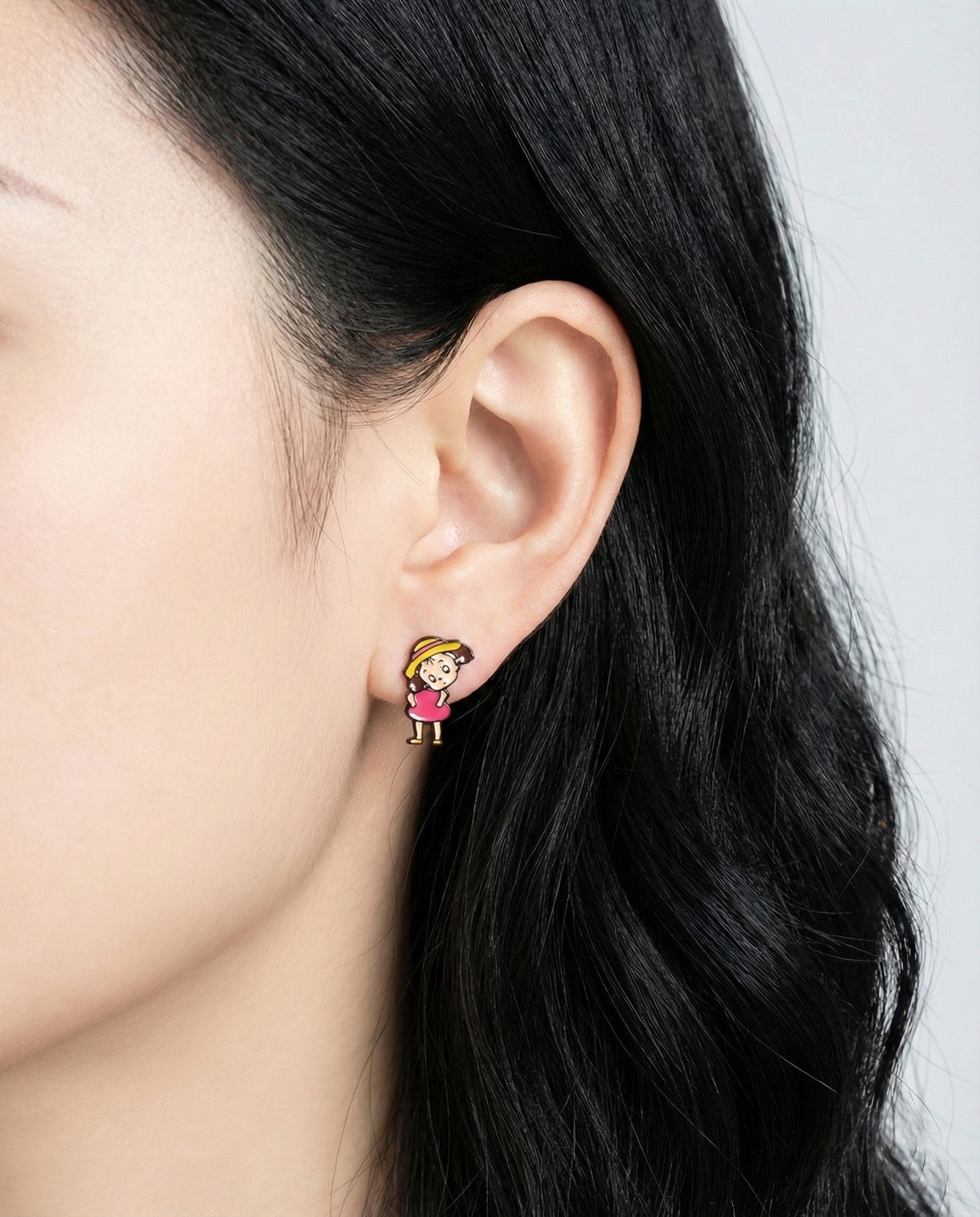 Woman wearing handmade Mei character earring from My Neighbor Totoro, cute anime jewelry