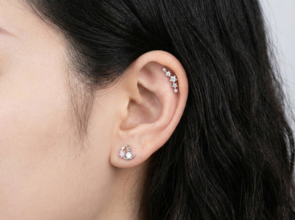 Silver moon rabbit barbell stud earring close-up showing intricate 3D sculpted bunny and star details