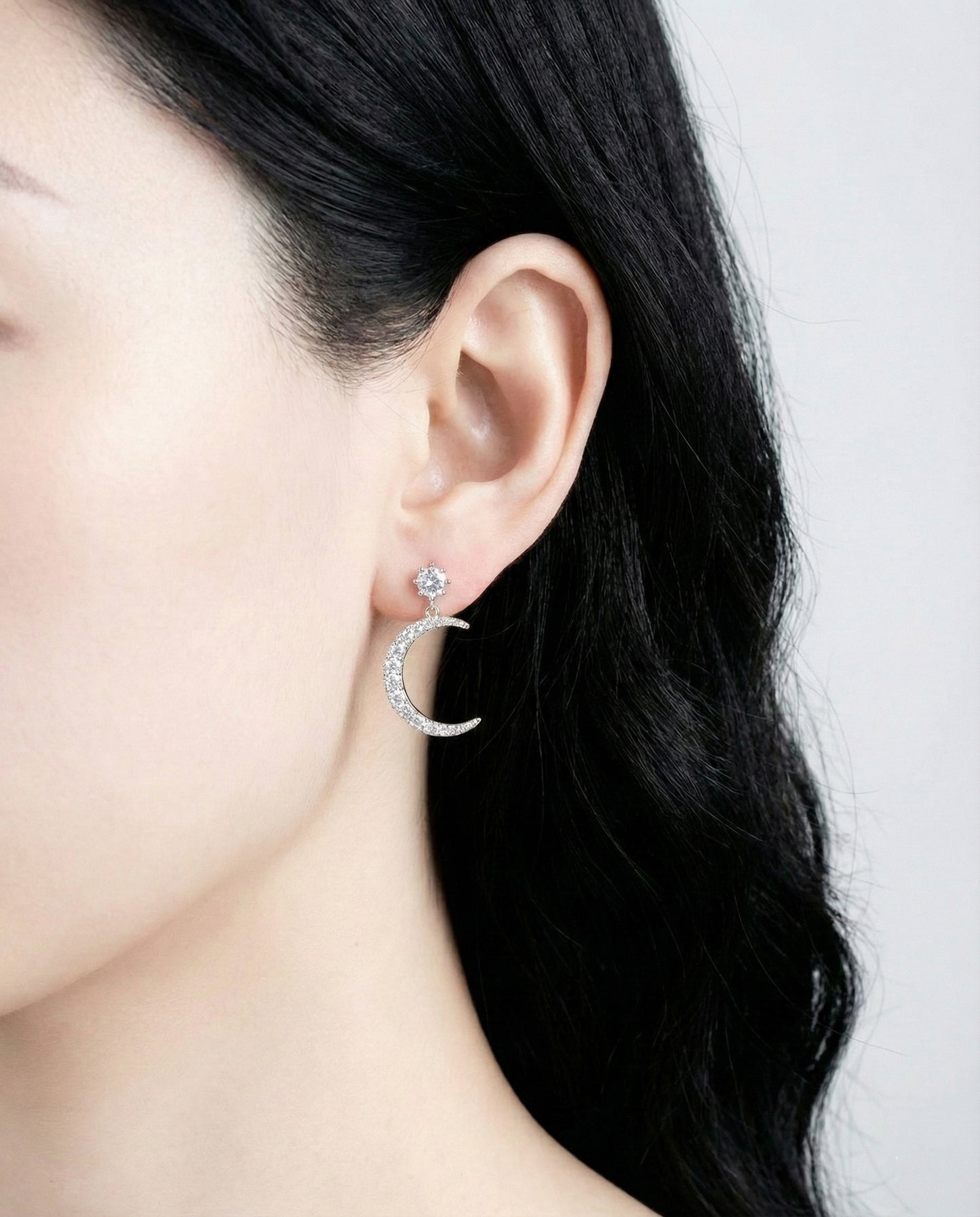 Crescent moon earring with pavé-set crystals side view