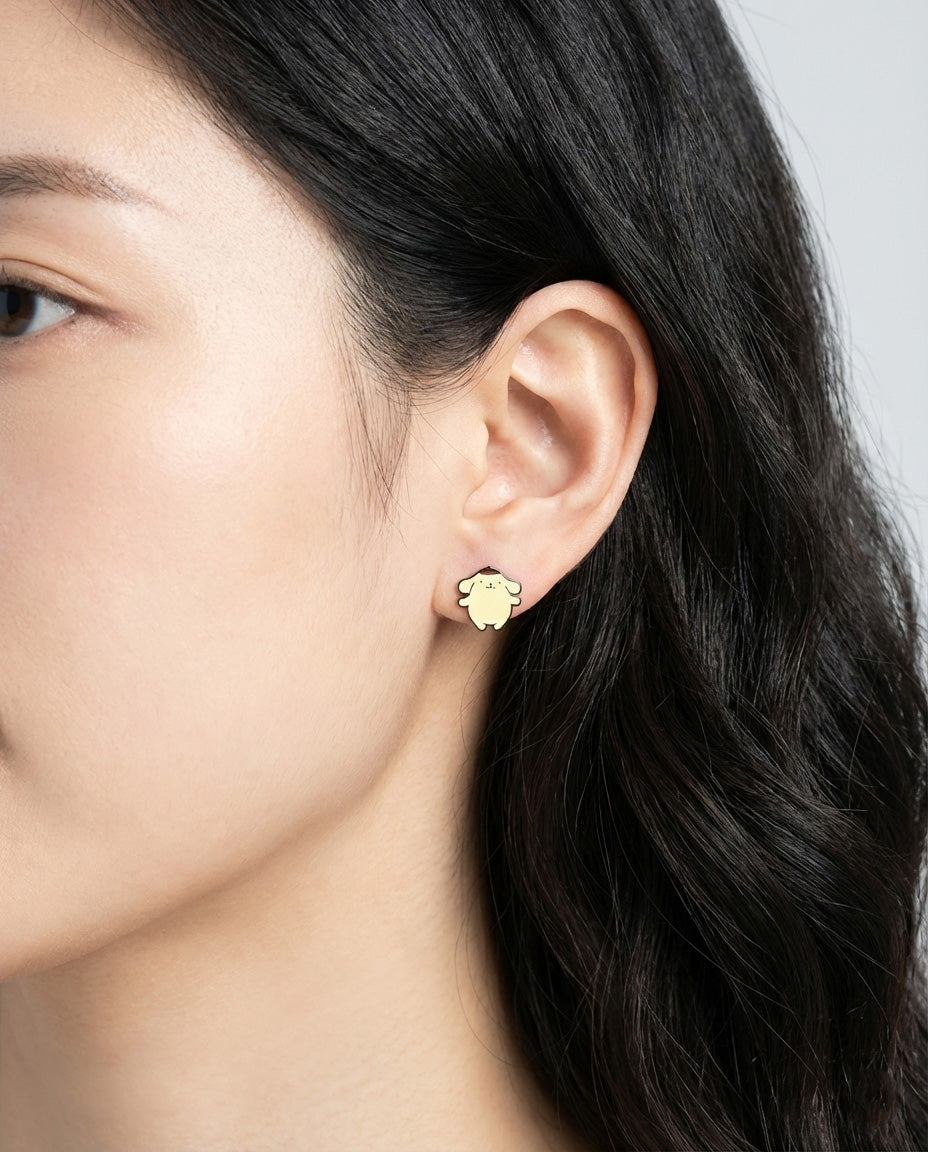 Woman wearing Pompompurin kawaii character earring on lobe