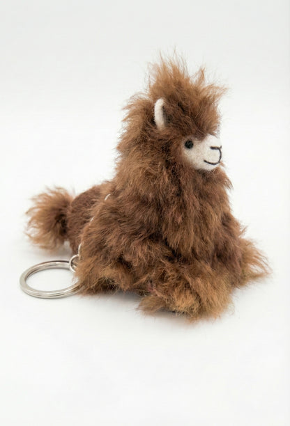 Real Peruvian alpaca fur keychain 4 inches tall with metal keyring on white background