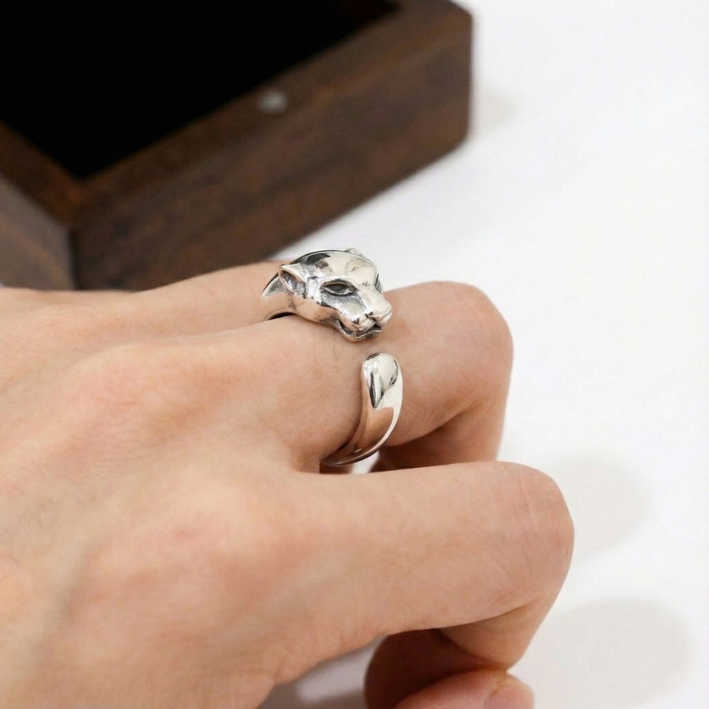 Close-up side view of solid silver panther ring 3.75 grams showing intricate facial features and oxidized finish