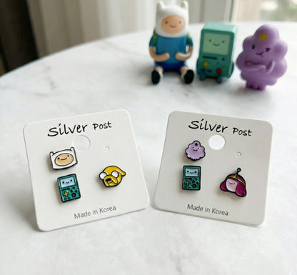 Adventure Time earrings set featuring Finn Jake BMO and LSP Princess Bubblegum on packaging cards with silver post labels