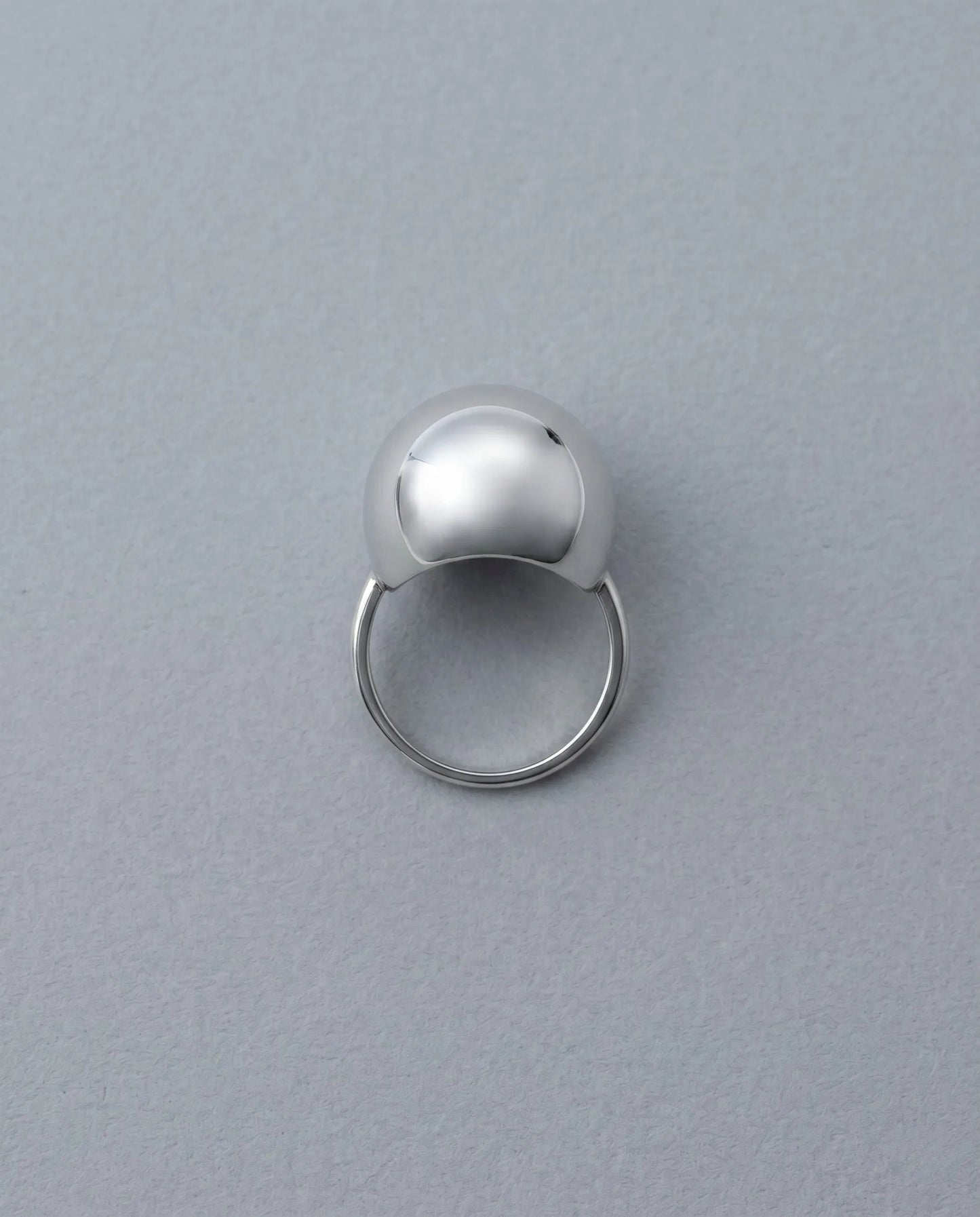 Top-down view 8ttitto8 hollow dome ring 925 silver, bold chunky statement ring custom made grunge aesthetic inspo.