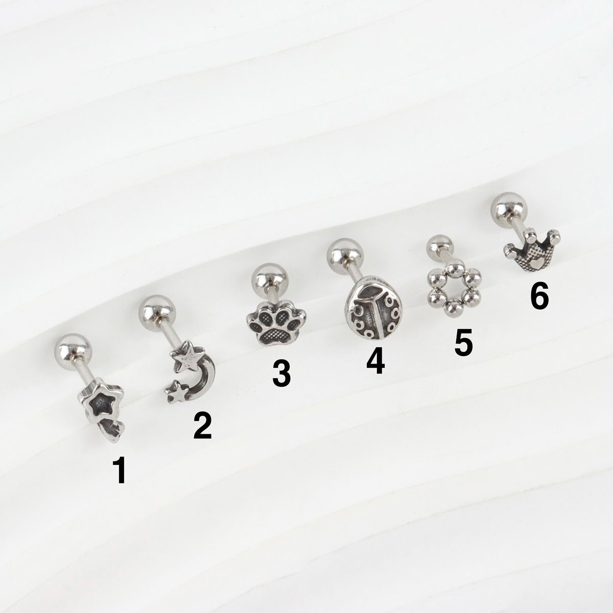 Vintage surgical steel piercing set numbered 1-6 with oxidized antique finish details