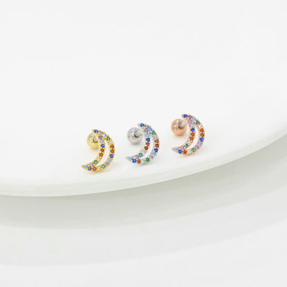 Colorful cubic zirconia moon piercing closeup