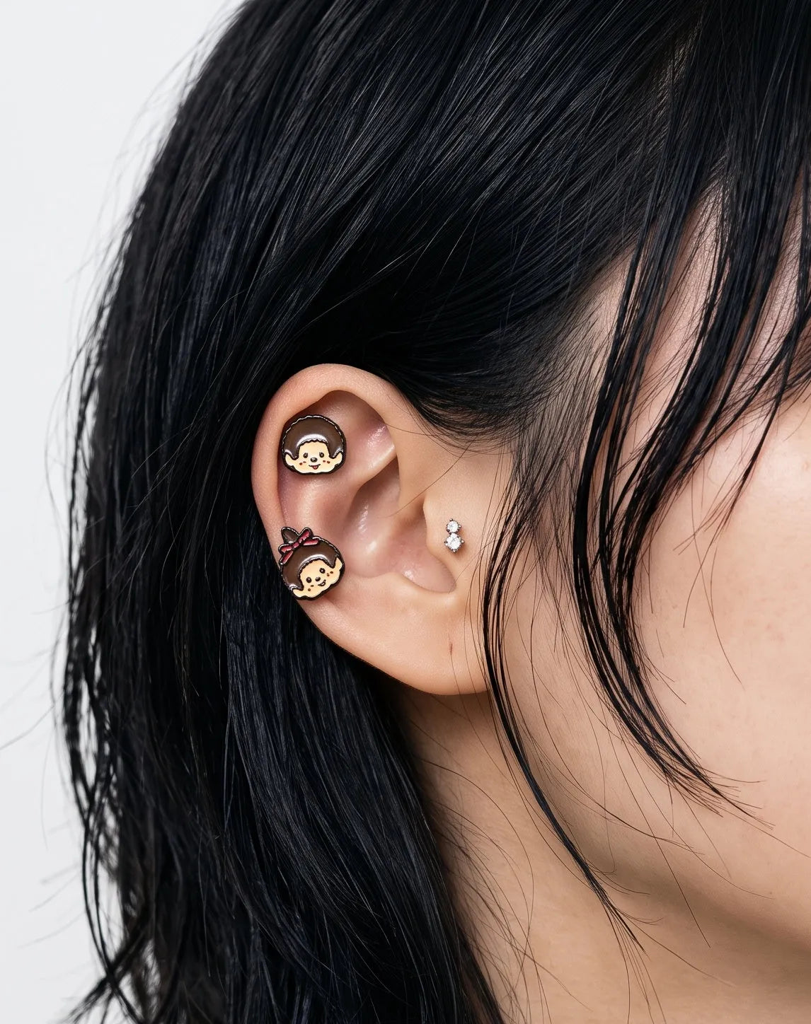 Monchhichi & Kiki mismatch earrings layered on one ear — curated ear stack, K-style kidult jewelry