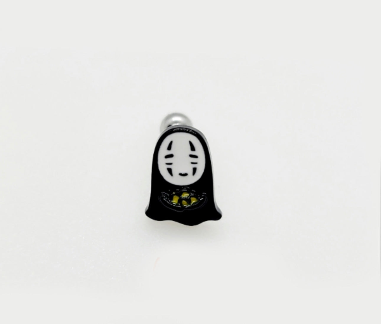 No-Face holding gold nuggets stud earring, black enamel finish with detailed gold illustration.