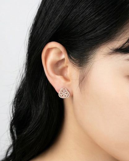 Side view woman wearing rose gold heart CZ earring showing delicate flower center detail, 925 sterling silver hypoallergenic posts, Korean handmade