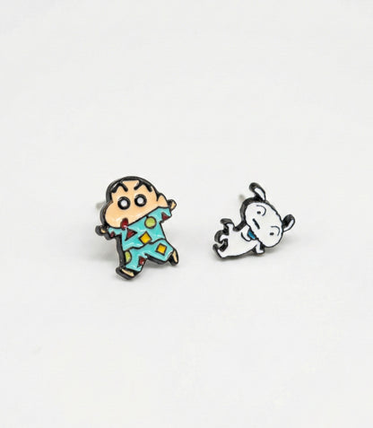  Shin-chan in geometric pattern pajamas and dancing Shiro enamel earrings displayed flat on white surface