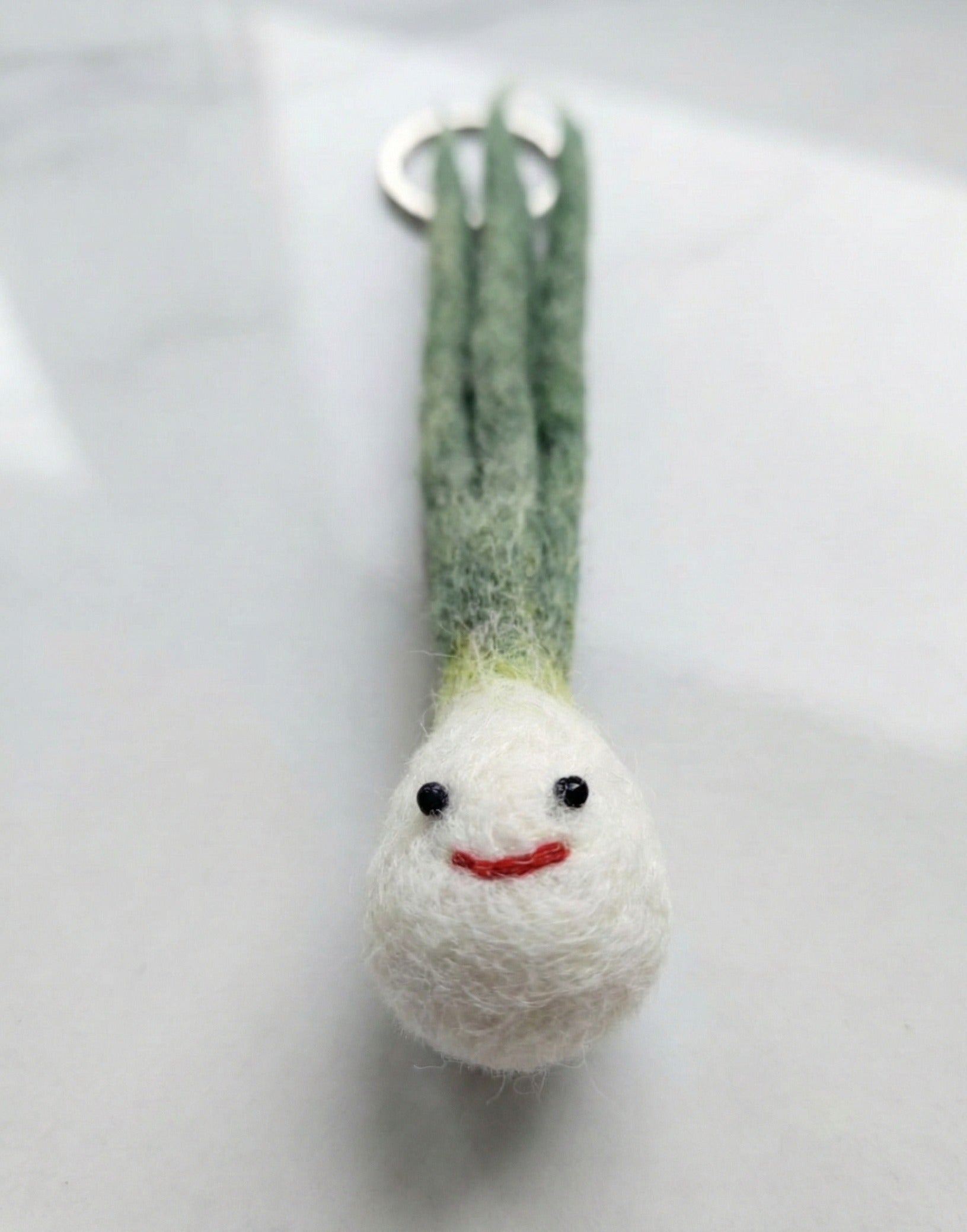 Handmade scallion green onion wool felt keychain with white bulb and green leaves