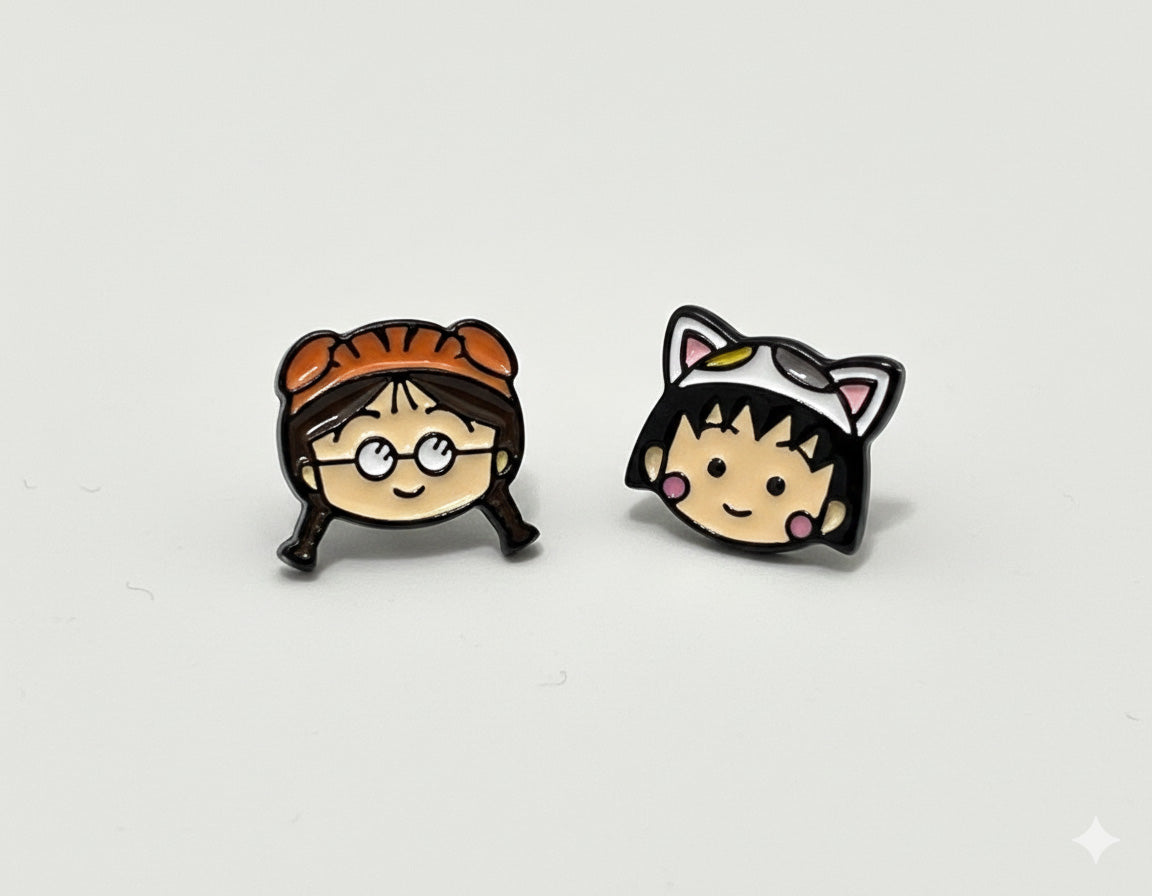 Two character earring studs showing Maruko cat and Tamae tiger face designs