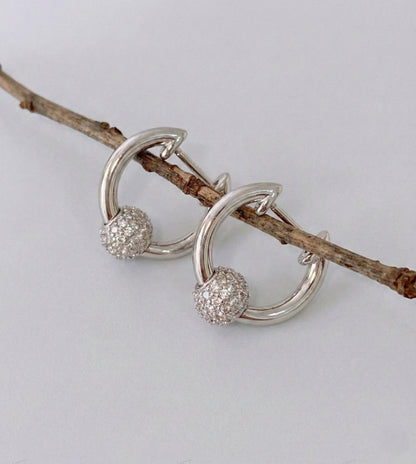 Silver cubic zirconia ball huggie hoops minimalist earrings on twig